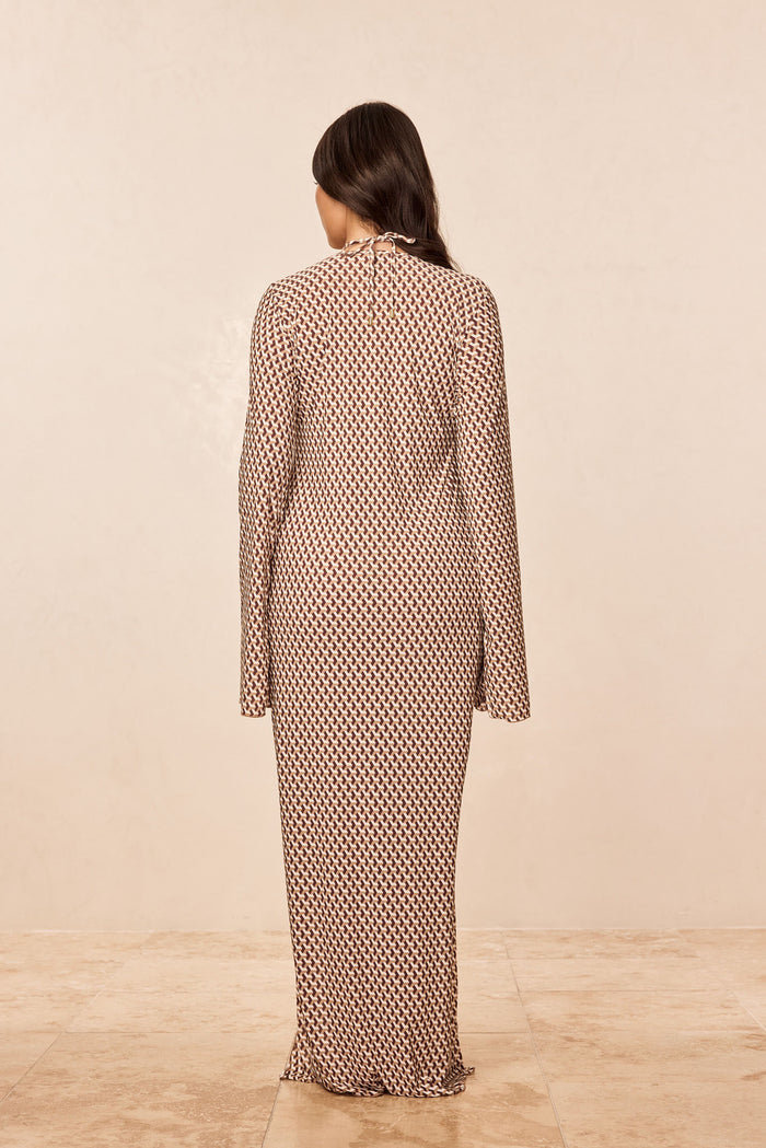 Back view of Marabella Kaftan in Husk Geo print, showing long sleeves, neck tie and brown geometric motif on beige backdrop