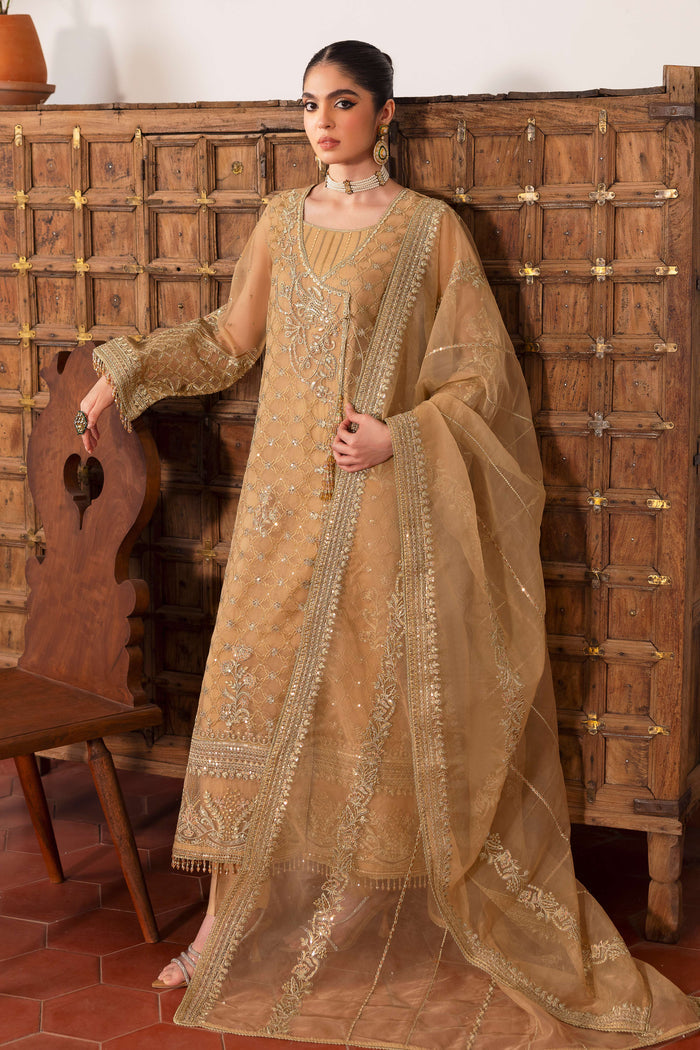 NAQSHI Marjaan warm‑beige organza angrakha shirt with all‑over floral embroidery, shimmering sequin texture, crystal hanging tassel on front and plain PK silk culottes.