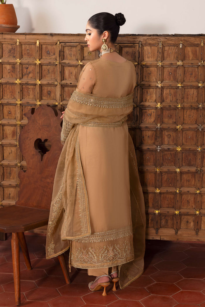 Rear of NAQSHI Marjaan shirt revealing extended embroidery border across back, crystal hangings on hem and organza's delicate texture.