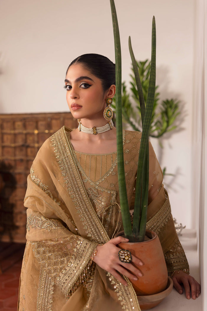 Close-up of NAQSHI Marjaan sleeve cuff emphasizing handmade crystal hangings and dense floral sequined motif on organza.
