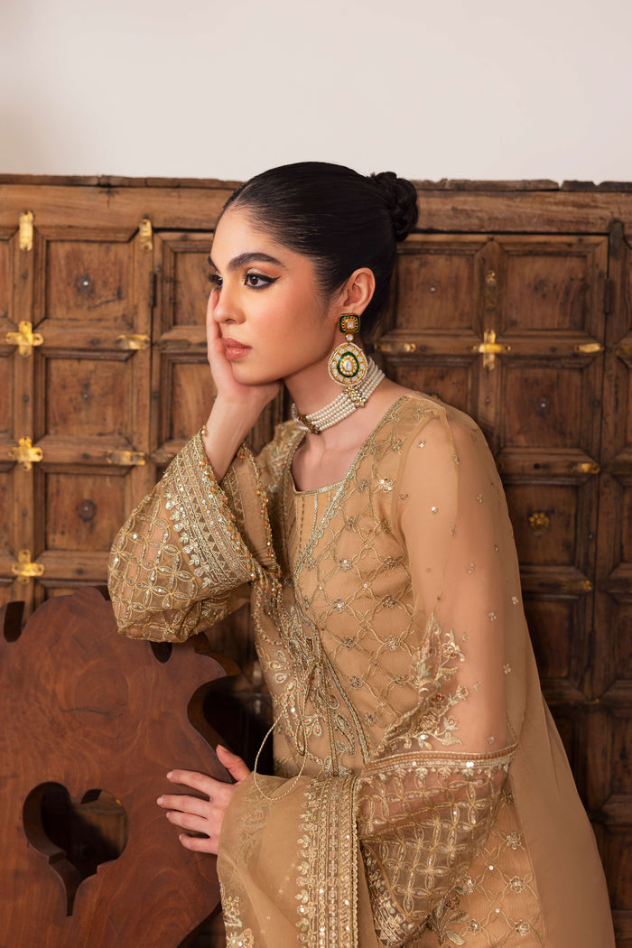 Detail of NAQSHI Marjaan front showcasing statement handmade tassel accented with crystal hangings at angrakha overlap.