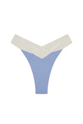 High-leg thong with V-cut blue ribbed front and cream crossover waistband.