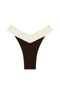 Front flat lay of Marseille Bottom in espresso and ivory showcasing shirred V-front color block waist and high-leg cheeky cut