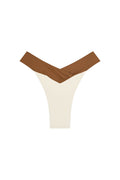 Front view of Marseille bottom in ivory with caramel V-shaped crossover waistband on white background