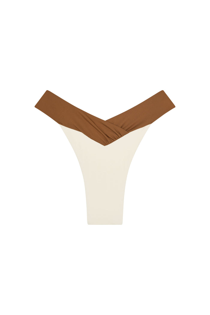 Front view of Marseille bottom in ivory with caramel V-shaped crossover waistband on white background