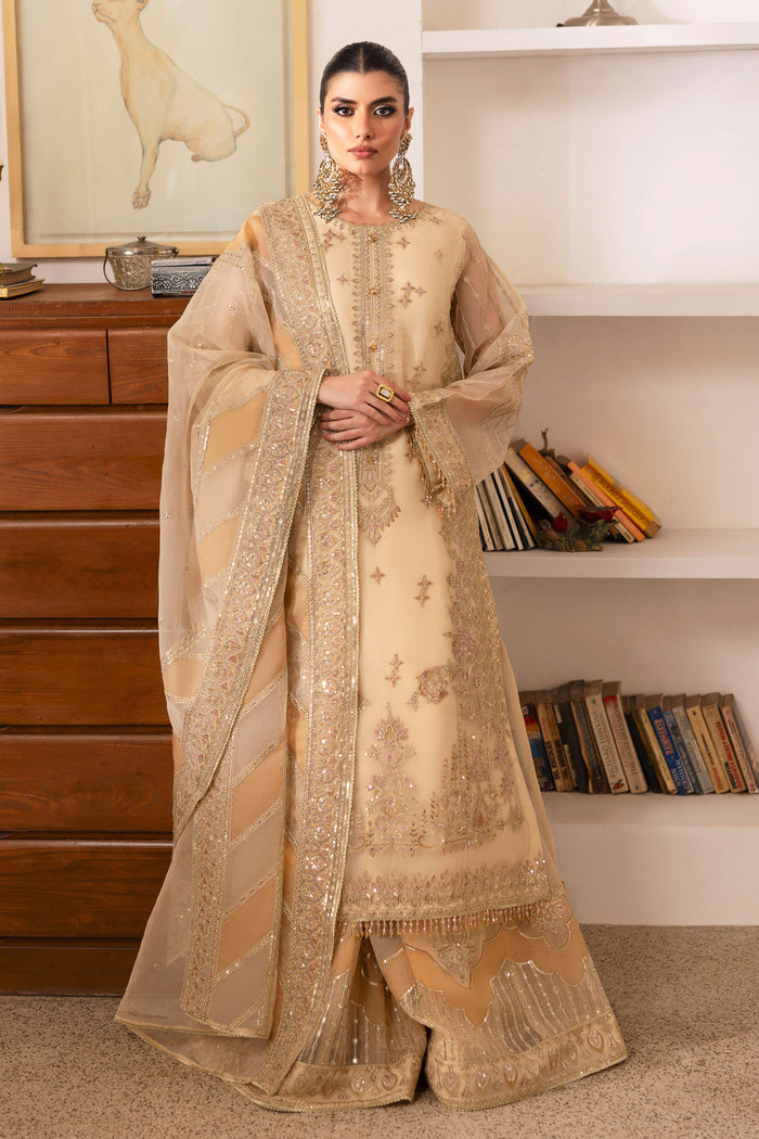 NAQSHI Marve porcelain‑skin organza straight‑paneled shirt featuring boat neckline embroidery, star motifs, sequin detailing, and crystal‑dangle accents visible.