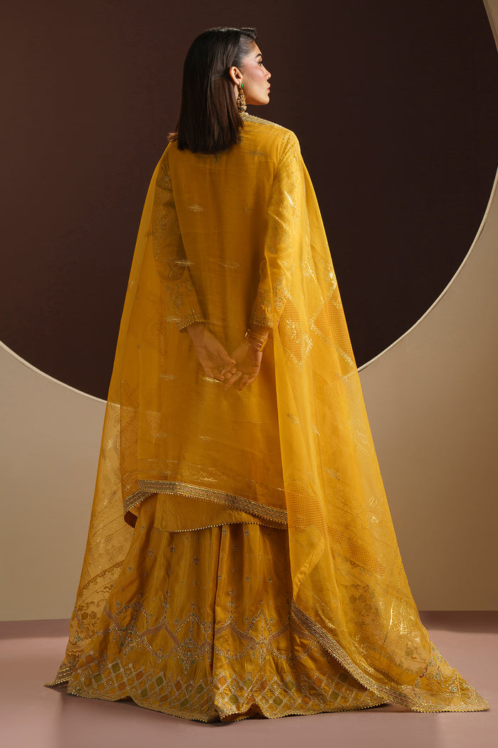 Back view of MAYA mustard sharara dress showing long embroidered open shirt and flowing organza dupatta
