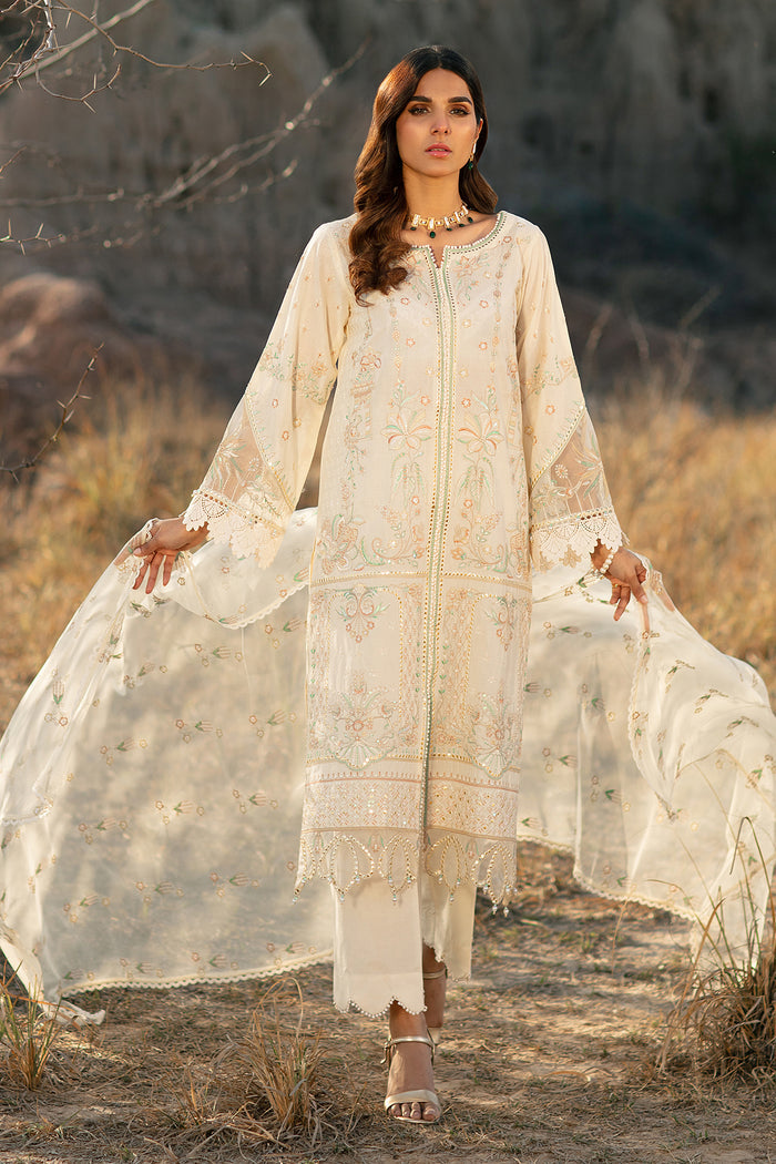 Front standing view showing long gown style off white shirt with detailed embroidery and lace work