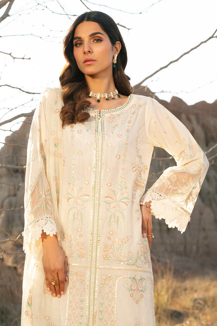 Side angle of Meehru off white open slit lawn shirt paired with culottes women Eid and family gathering outfit