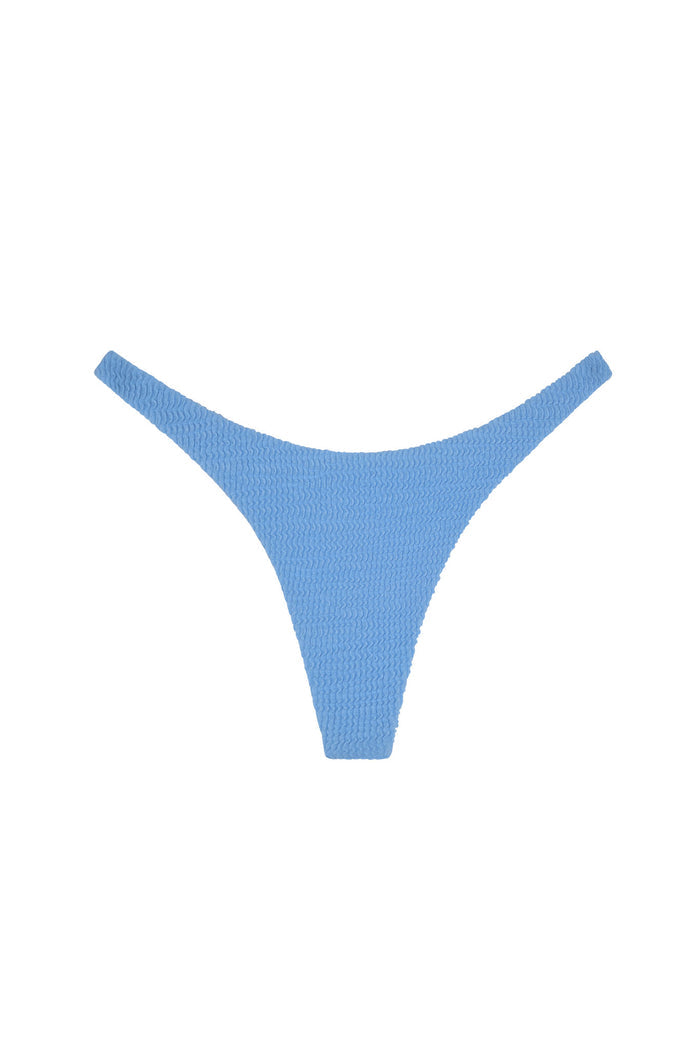 Front view of Milos Thong in Azure Crinkle showing seamless, textured fabric and mid-rise thong silhouette on white background