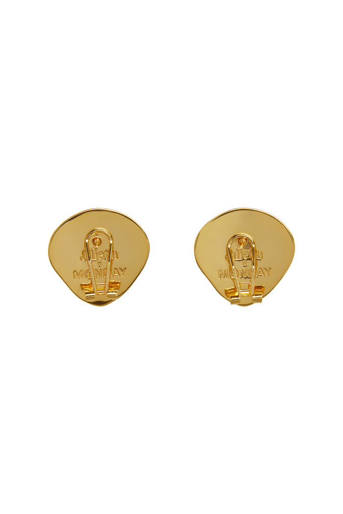 Back view of Monaco 18K gold-plated triangle earrings showing stud backings and engraved Julietta x MONDAY logo on white background