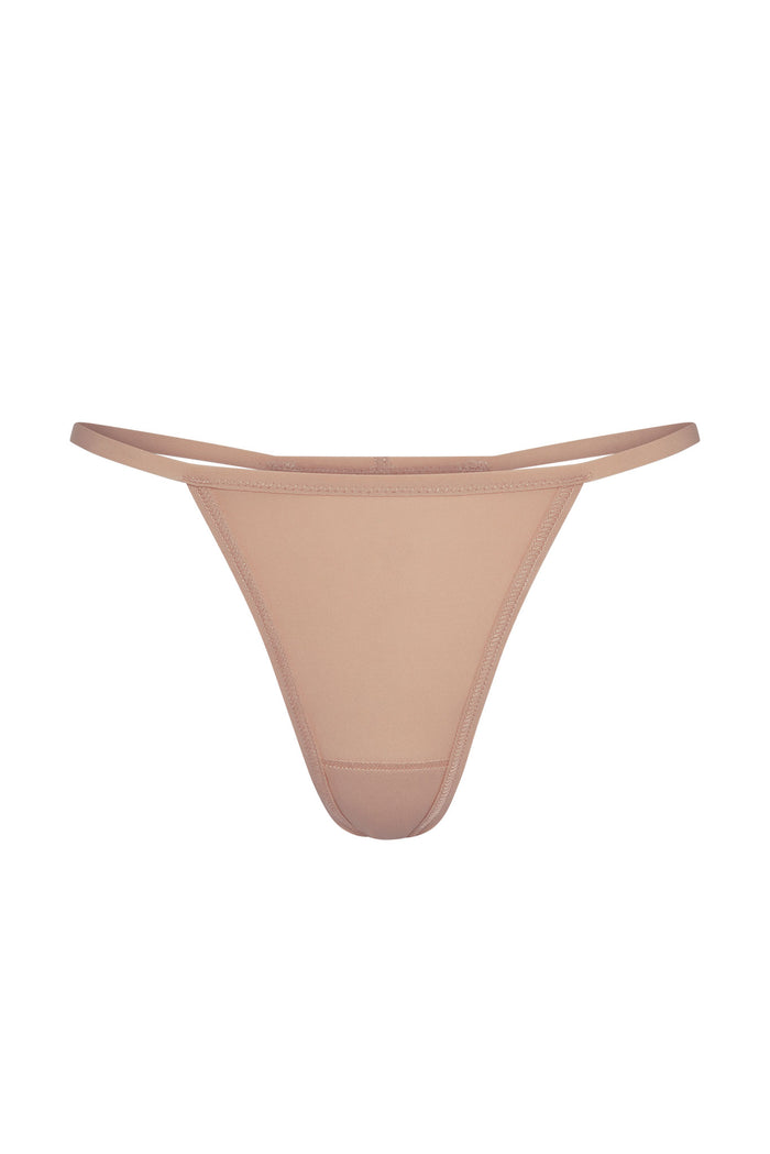 Front view of G-string underwear showcasing thin side straps and minimal coverage in blush on white background