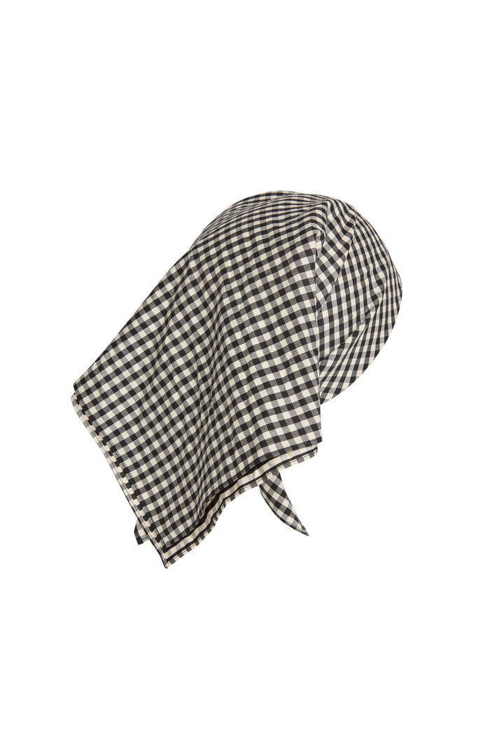 Angled draped view of head scarf showing black gingham check, square shape, lightweight cotton blend on white background