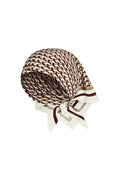 Three-quarter view of Monday Head Scarf Husk Geo Silk showcasing brown and ivory geometric silk print on white background