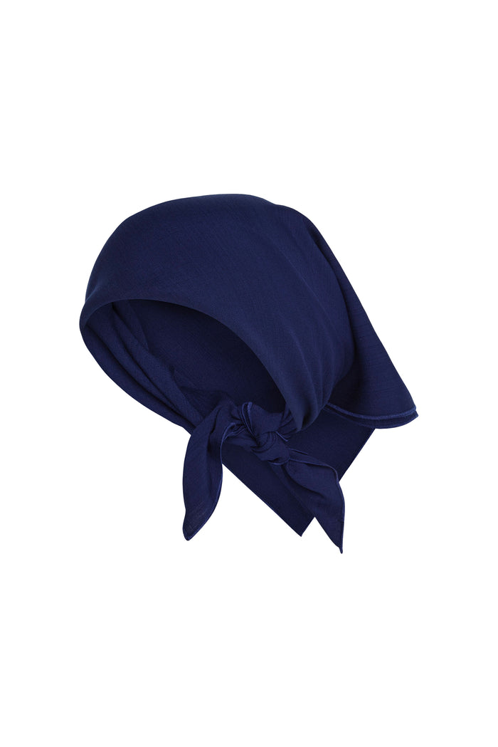 Close-up of Monday Head Scarf in Midnight showcasing knot detail and square shape on white background