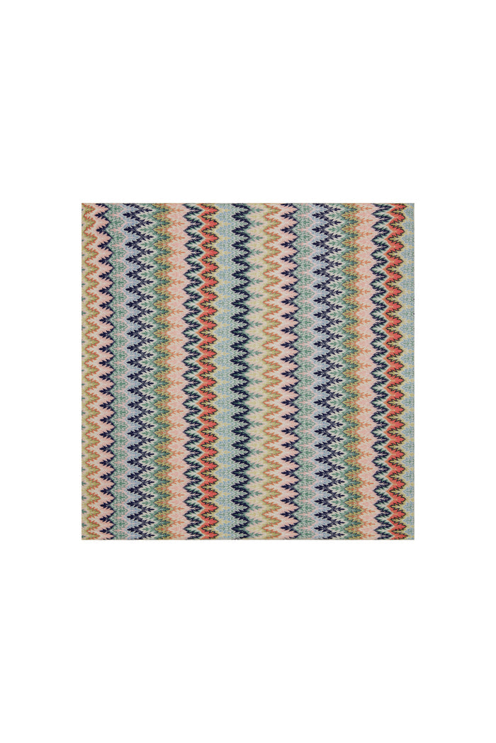 Flat lay of Monday Head Scarf Porto Cervo Multi showcasing multicolor zigzag chevron print on lightweight fabric with white background