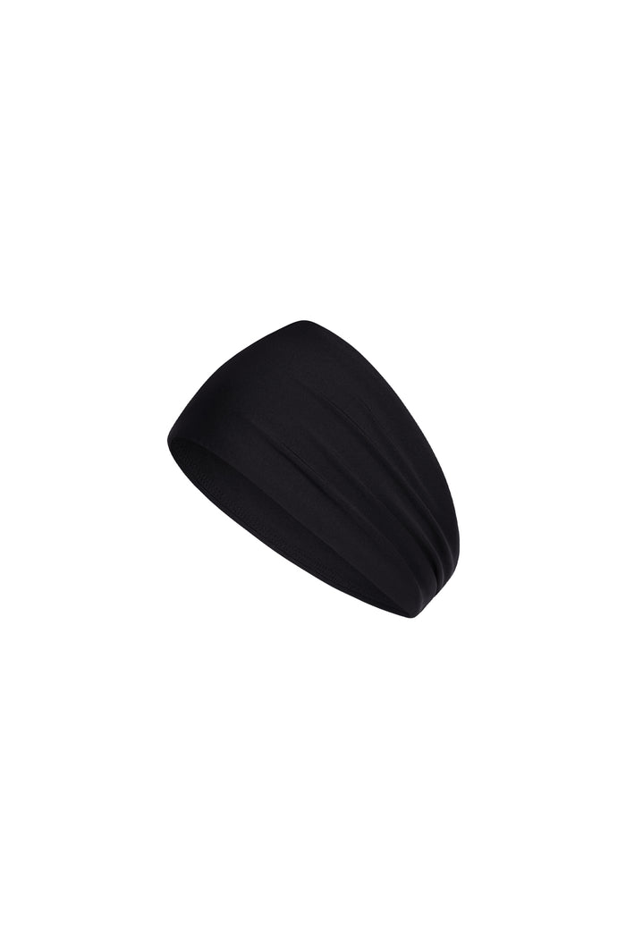 Angled close-up of Monday Headband - Black showcasing wide swim-fabric silhouette on white background