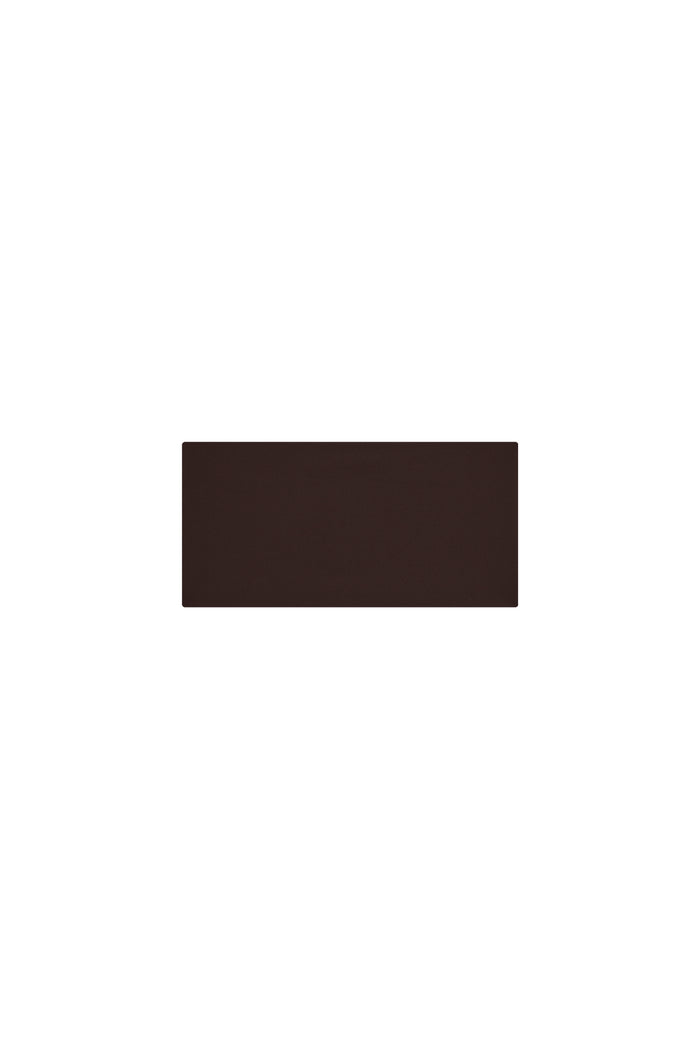 Flat lay of Monday Headband in Espresso showing wide swim-fabric silhouette on white background