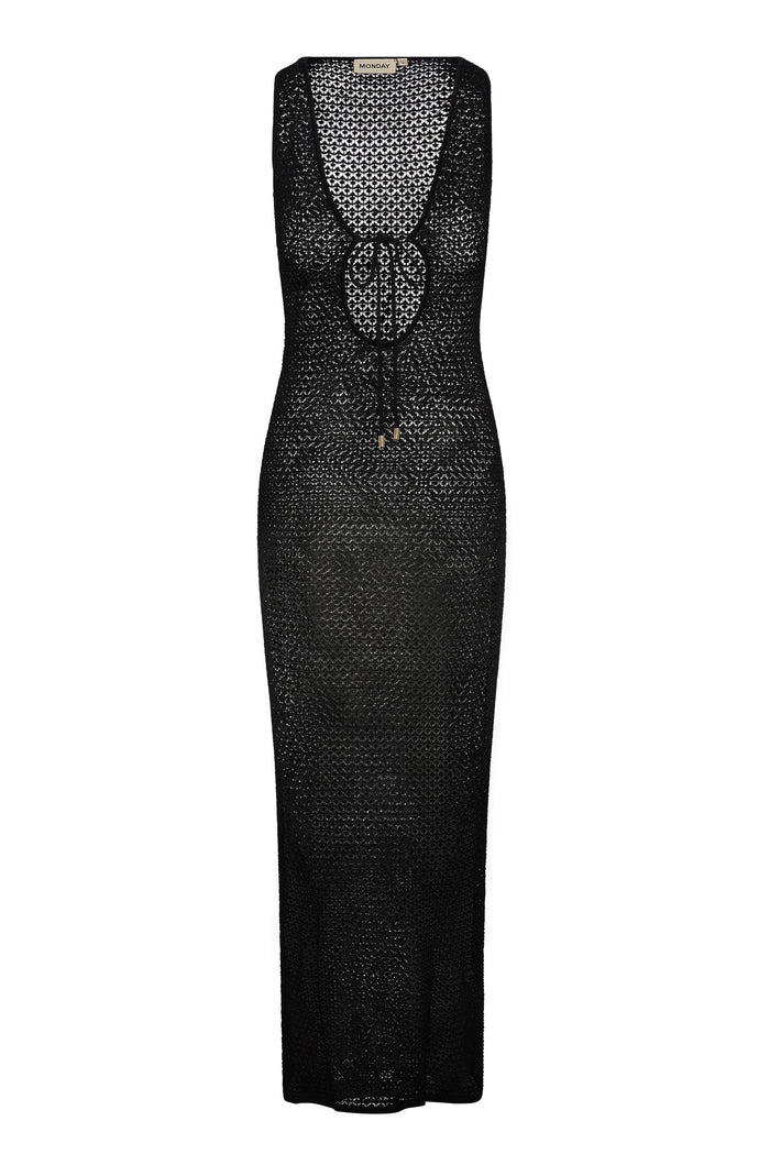 Front view of Monte Carlo Tie Dress in black lace crochet showcasing scoop neckline, tie-front keyhole and sheer maxi silhouette on white background