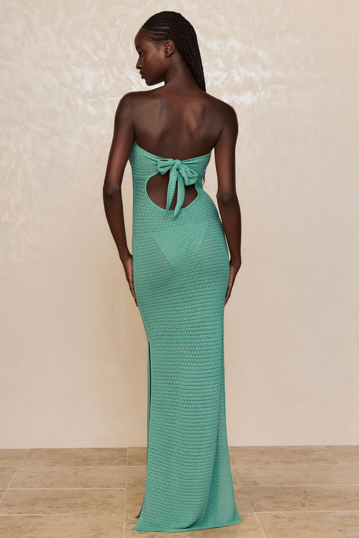 Back view of Montego Bandeau Dress in Pond Lace Crochet showing strapless silhouette and rear cutout with tied bow