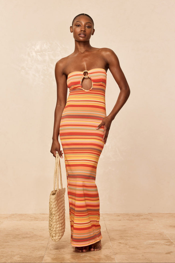 Front view of Montego Bandeau Dress in Sardinia Stripe, strapless bodycon with chest ring cutout, beige background