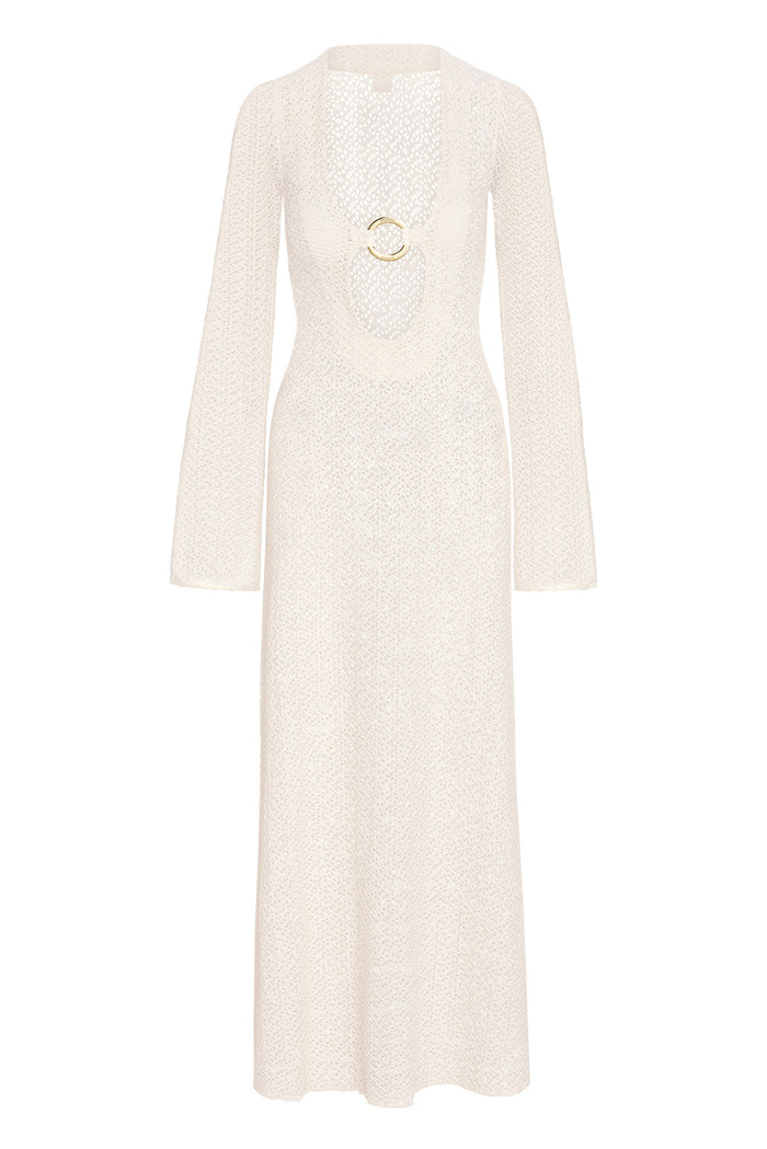 Front view of Montego Dress in ivory crochet with deep scoop neckline and gold ring, long bell sleeves, and floor-length skirt on white background