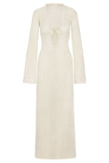 Front view of Montego Dress in ivory knit showcasing deep V with gold O-ring and long bell sleeves on white background