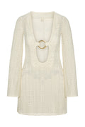 Front view of Montego Mini Dress in ivory crochet with deep scoop neckline and gold ring, long bell sleeves on white background