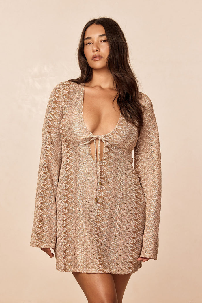 Front view of Montego Mini Tie Dress, Porto Cervo Gold, on model showing deep scoop neckline, tie-front, textured knit