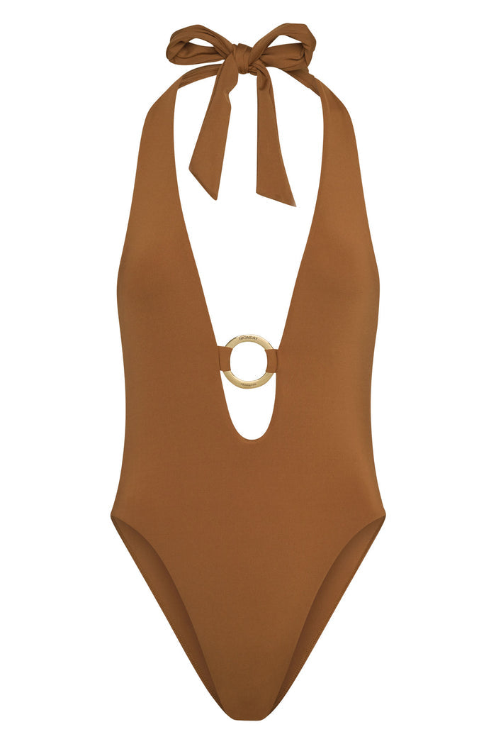 Front view of Montego One Piece in caramel with deep V neckline, knotted halter tie and gold ring engraved Monday Swimwear