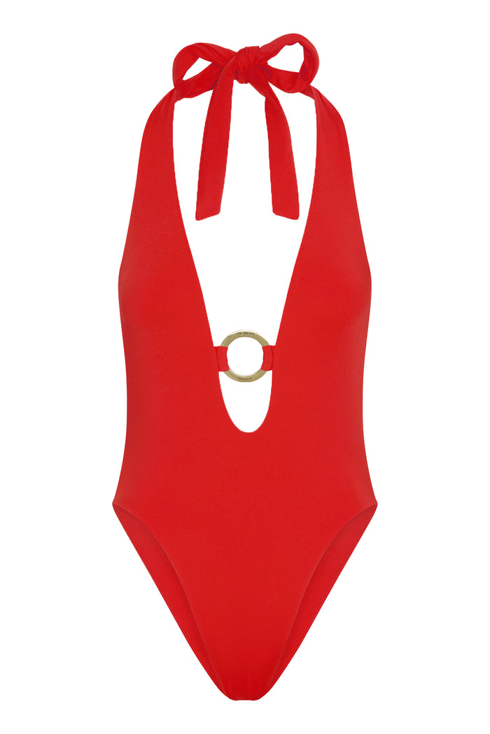 Close-up front view of Montego One Piece in Chili Pepper showcasing plunging halter neckline, gold center ring detail, and high-cut leg on white background