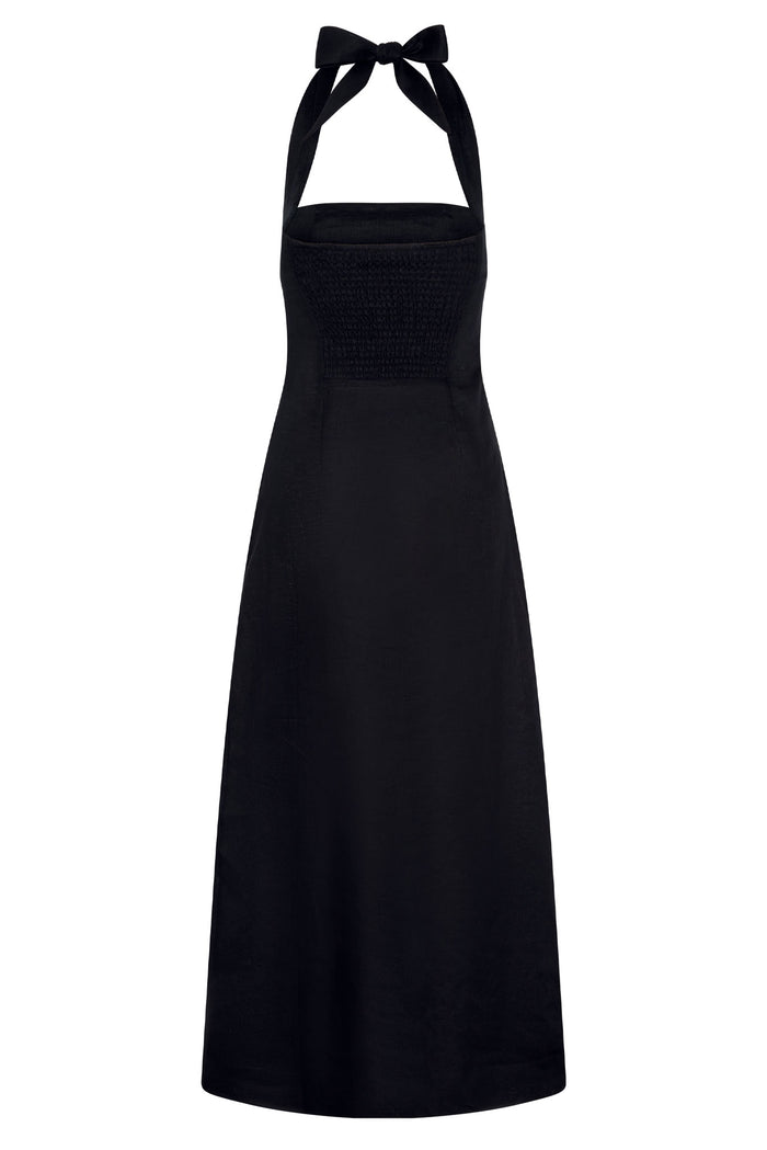 Black halter maxi dress with smocked square bodice and tied halter bow straps