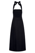 Black halter maxi dress with smocked square bodice and tied halter bow straps