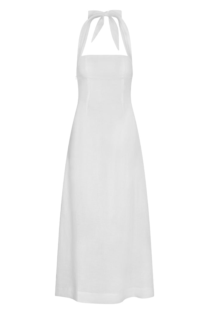 Front view of Montserrat Dress in white linen showcasing halter tie at nape, fitted bodice and flowing maxi skirt on white