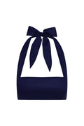 Front view of Montserrat top in midnight linen showcasing halter tie bow and square bandeau bust on white background