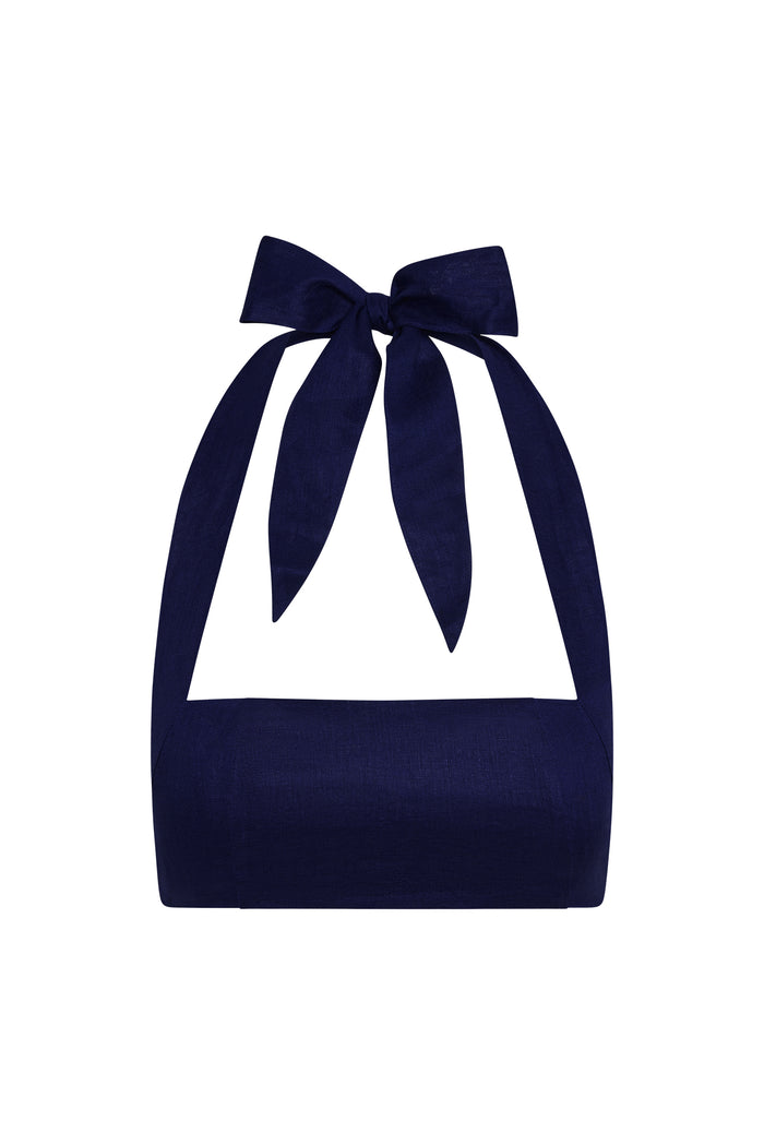 Front view of Montserrat top in midnight linen showcasing halter tie bow and square bandeau bust on white background
