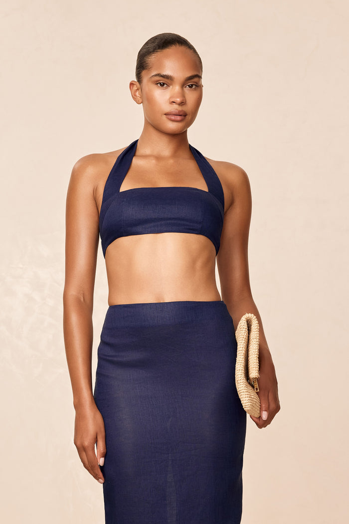 Front view of Montserrat Top in Midnight Linen on model, showing bandeau front and wide halter straps