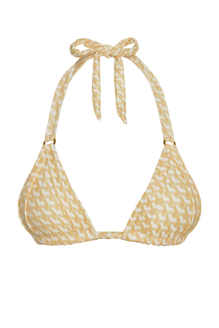 Front close-up of Morocco Top Ivory Geo showing triangle cups, halter tie bow, gold ring hardware on white background