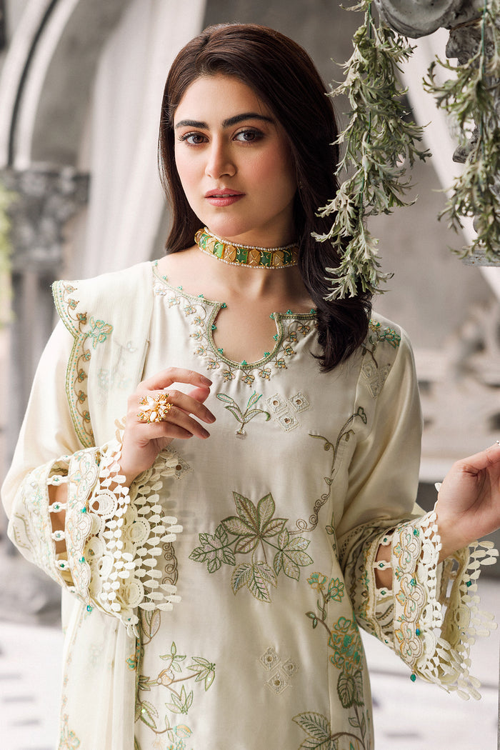 Close view of sleeve embroidery with organza borders and loops detail