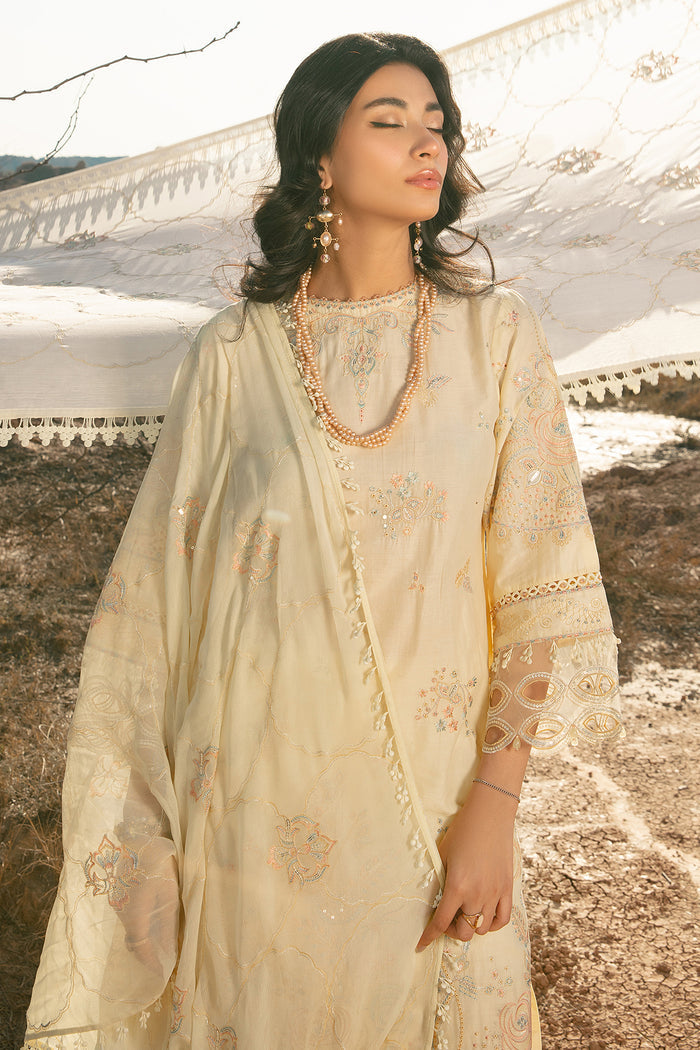 Close portrait of Nazakat light yellow outfit highlighting round neckline embroidery and neat long shirt cut
