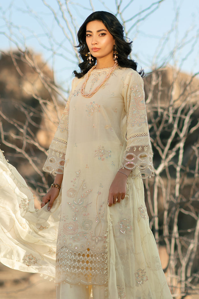 Side angle view of light yellow embroidered lawn suit with flowing crinkle dupatta festive ready to wear dress
