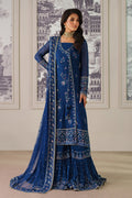 Nia by NAQSHI full front view in navy blue crinkle chiffon with embroidered shirt, voluminous sharara, and delicate tassel hangings