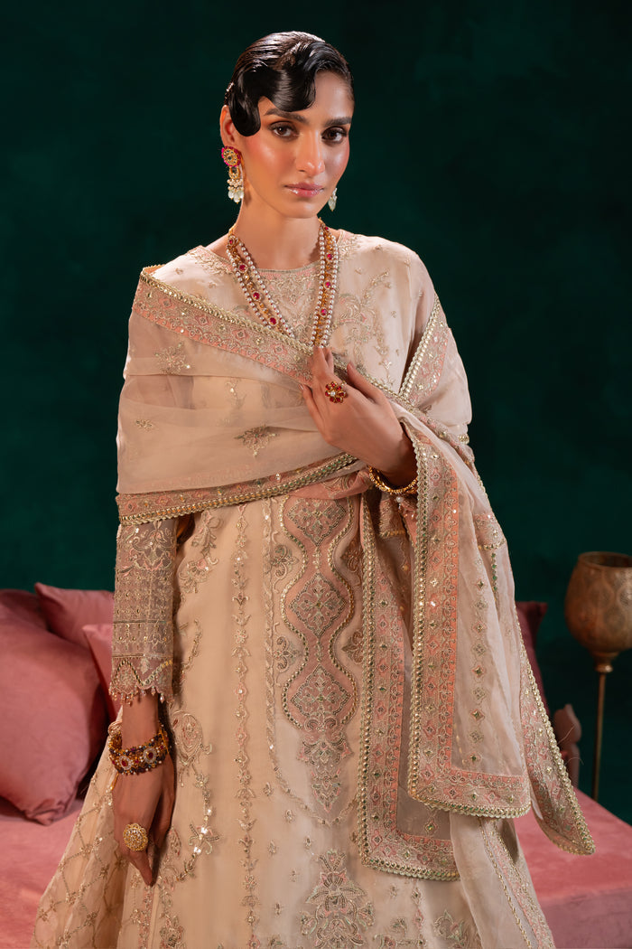 Close-up of Naqshi Nigaar lehenga panel showing dense sequin jaal embroidery with multi‑head motifs and sequin-thread embroidered borde