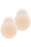 Top view of Nippies Skin Lift silicone nipple covers showing adhesive lift design in creme on white background