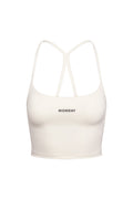 Front view of Olympic Tank in ivory showcasing cropped fit, thin double racerback straps and centered MONDAY logo on white