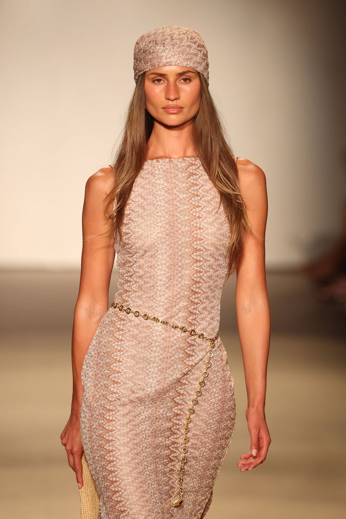 Front of Oslo Dress Porto Cervo Gold, fitted crochet knit, high boat neck, sleeveless, chain waist belt