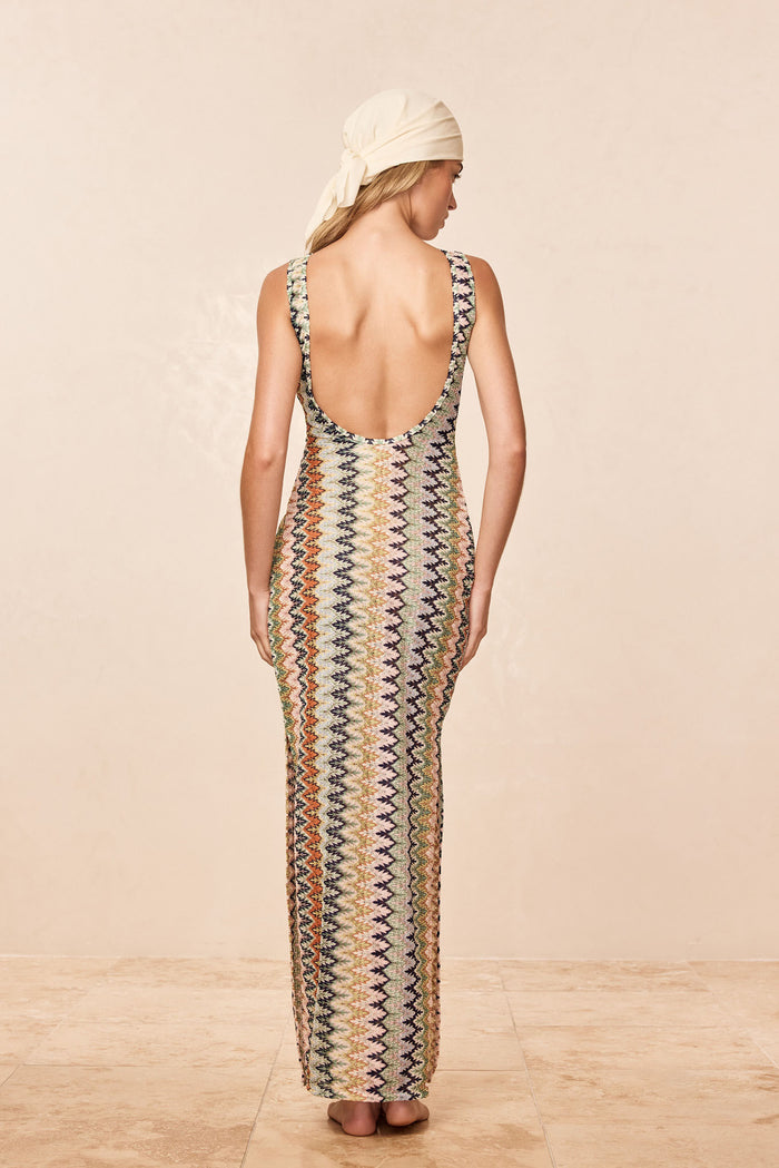 Back view of Oslo Dress in Porto Cervo Multi showcasing low scoop back and multicolor zigzag knit on beige background