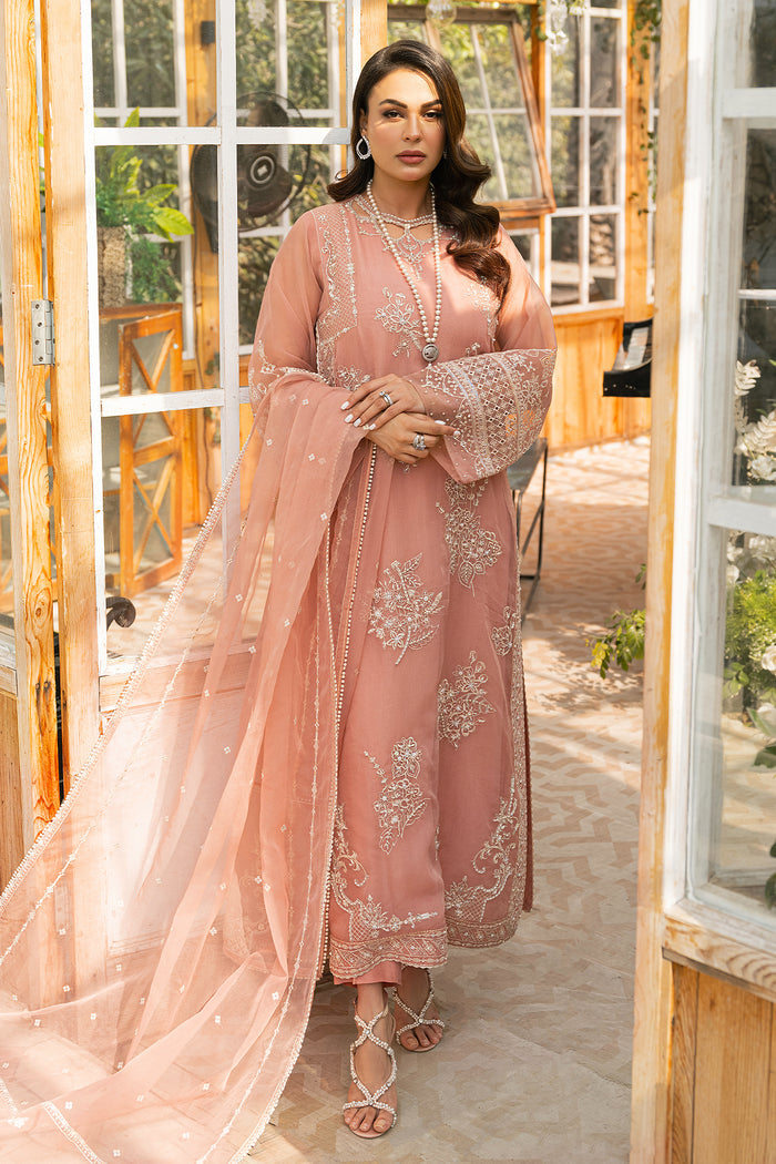 Standing pose of Ovate peach dress showing soft dupatta drape and clean long shirt fall, elegant ready made formal attire.