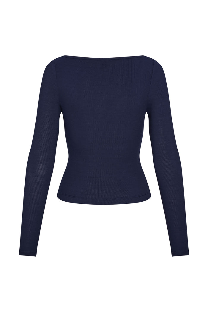 Back view of Paddington long sleeve top in Midnight, lightweight rib knit with fitted waist on white background