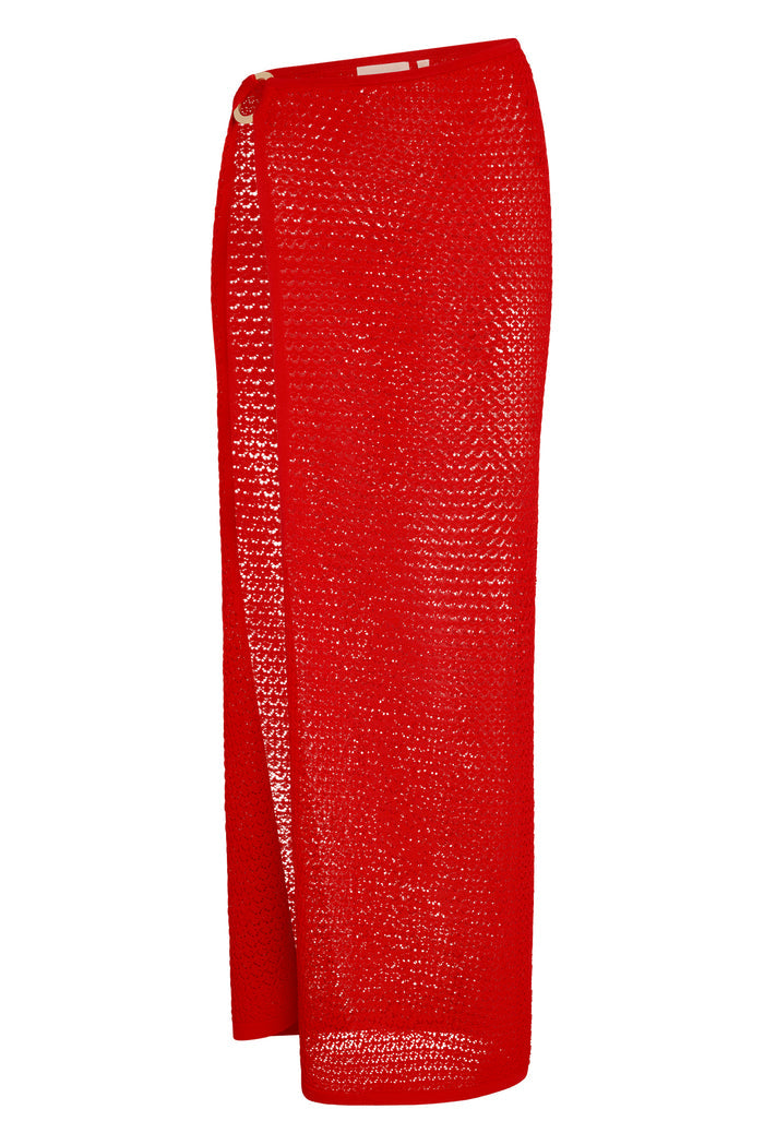 Close-up view of Palermo Skirt in Chili Pepper crochet showing side slit and gold ring on sheer fabric